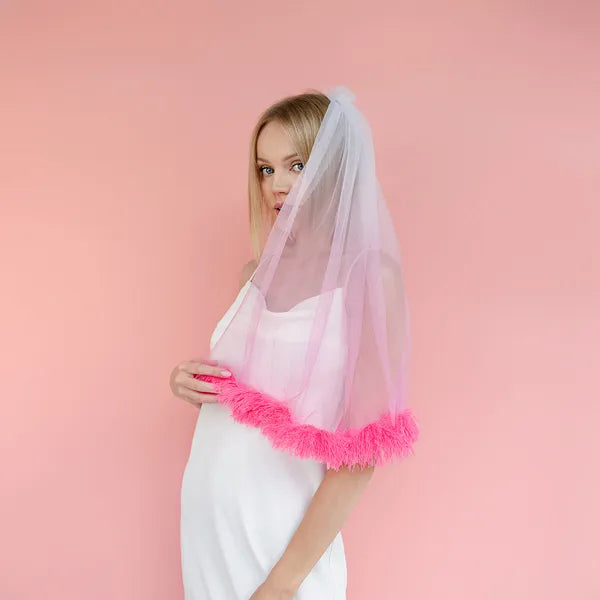 VÉU COM PLUMAS ROSA 69CM